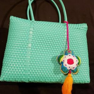 Made with recycled plastic, top notch tote!